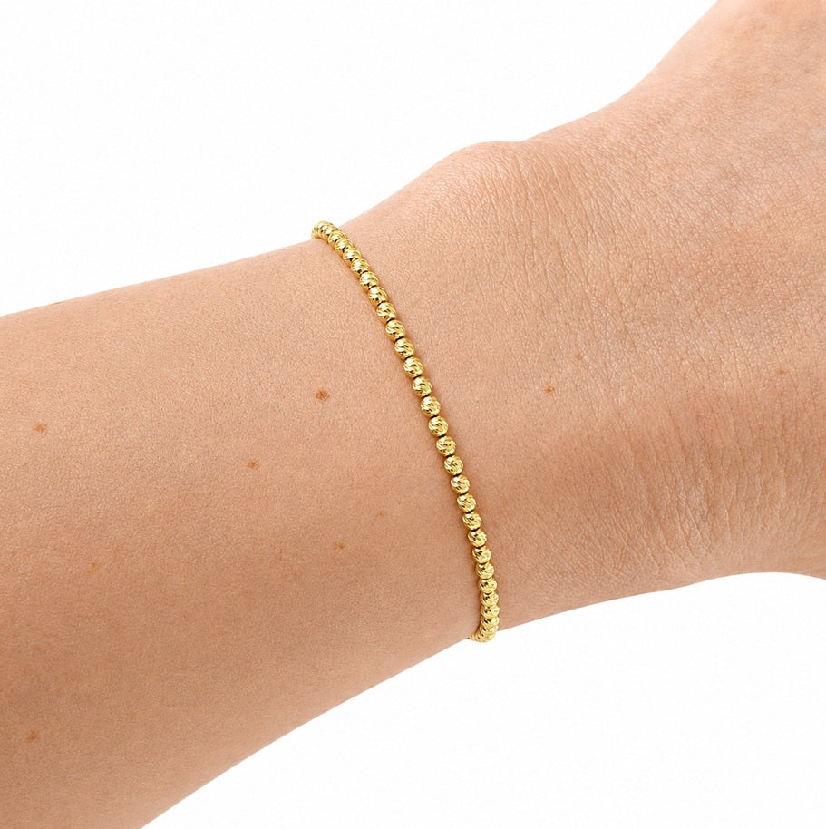 Armband mit geschliffenen Kugeln Gelbgold